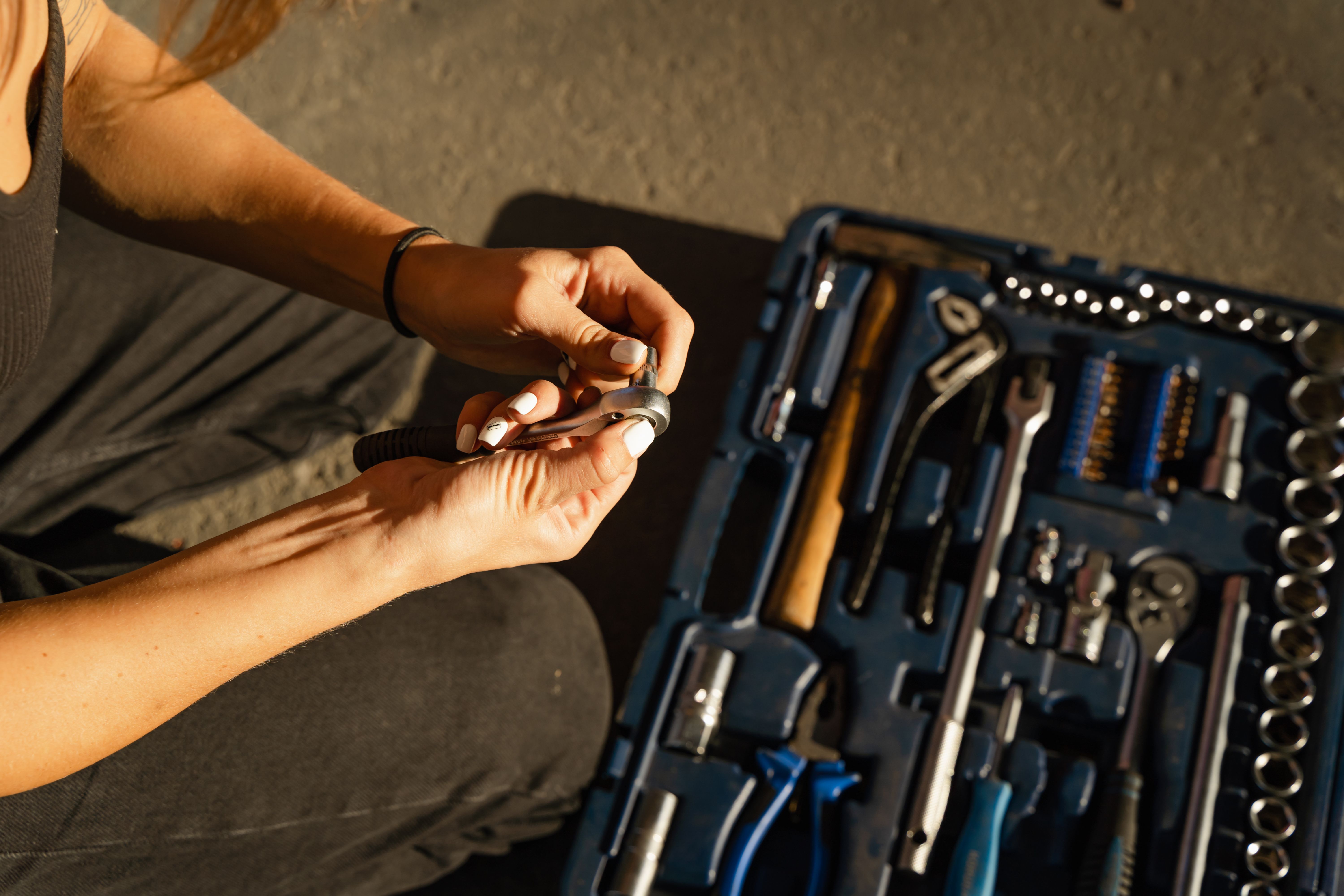 Plumber preparing tools for a repair visit
