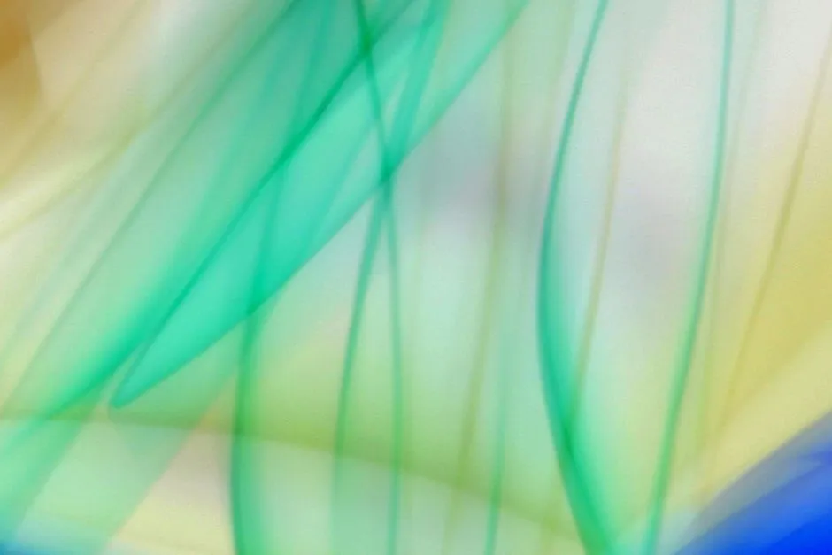 An artistic depiction of abstract vertical green light streaks creating a forest-like illusion.